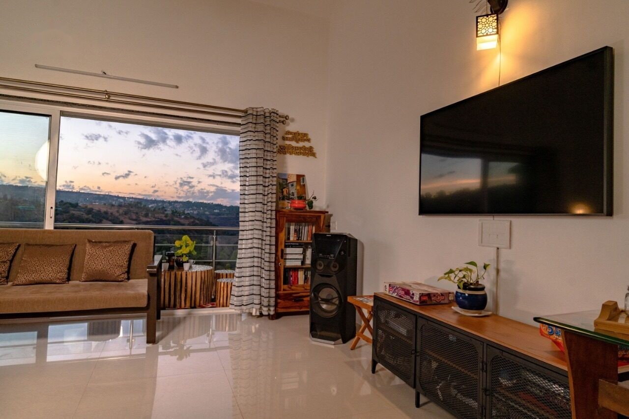 Living room with valley view windows